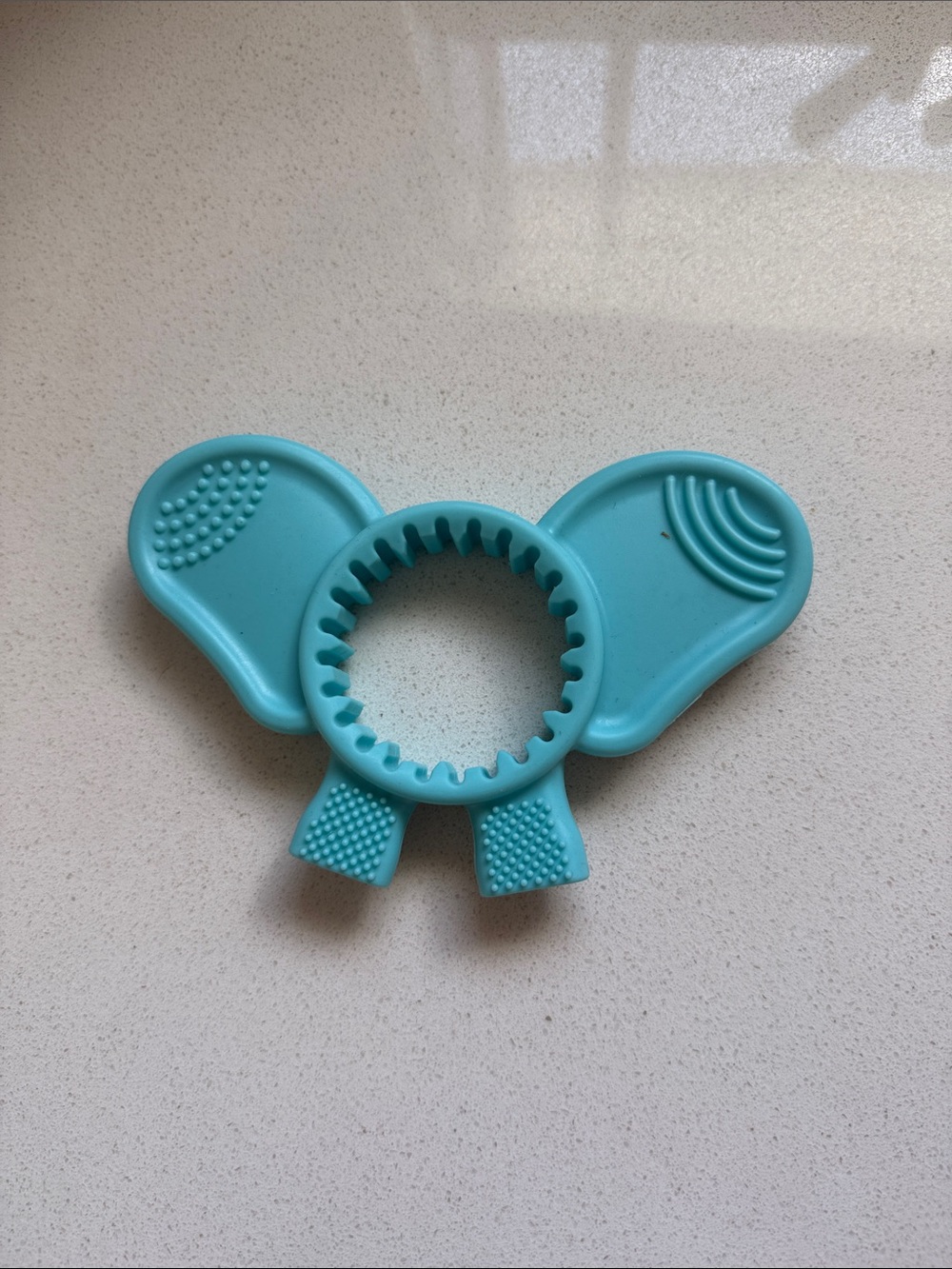 Bottle propper and teether